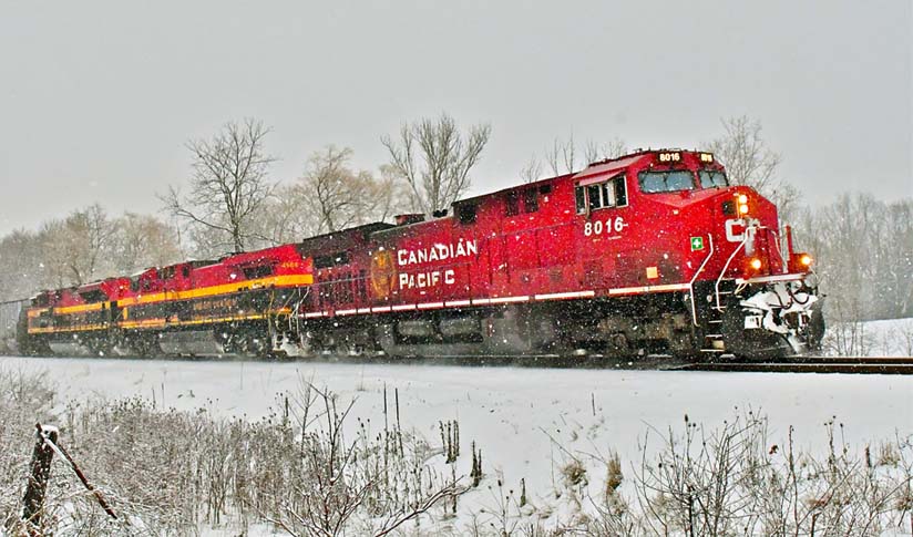 A CP train with KC units westbound at Orrs Lake.