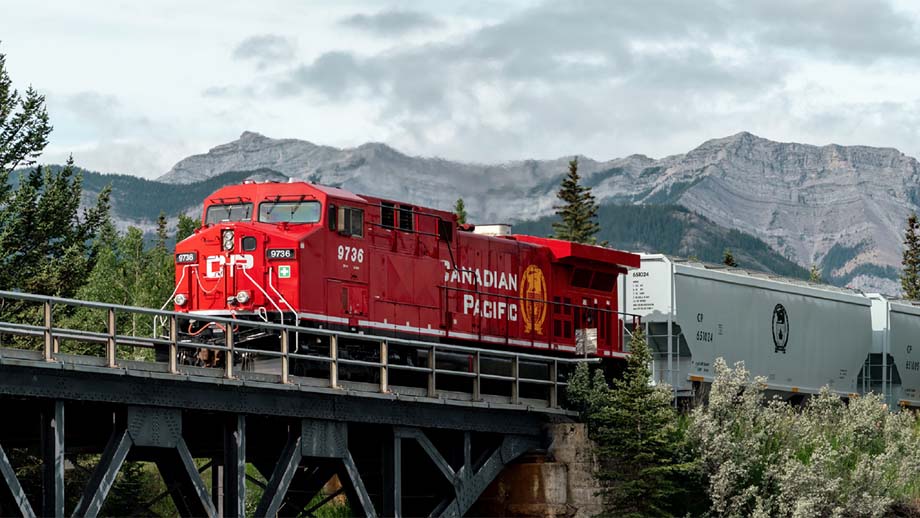 A Canadian Pacific unit potash train crosses the Seebe bridge.