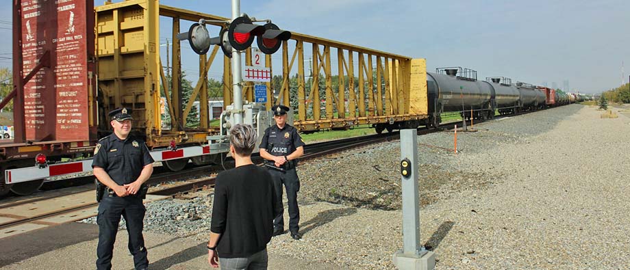CPPS constables at a rail crossing.
