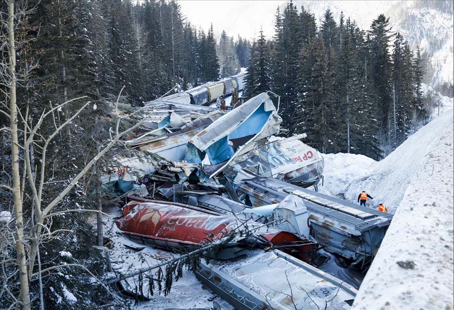 Wreckage beside the Trans-Canada Highway overpass from the February 2019 derailment.