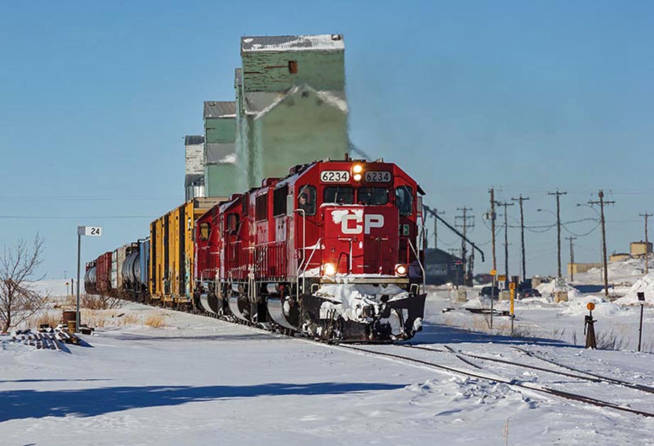 CP Train A44 rolls to a stop near Purple Springs, Alberta.