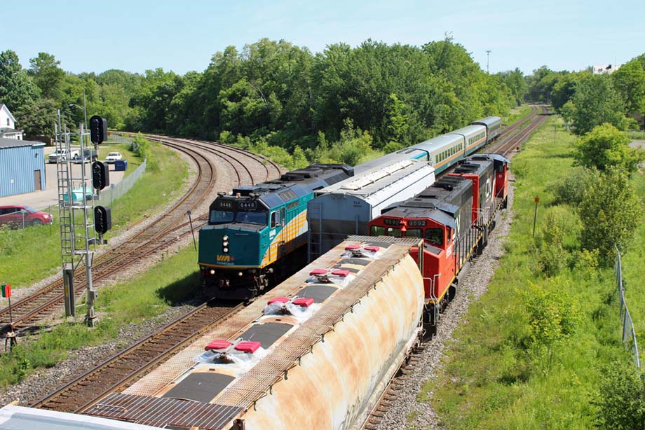 A Toronto bound VIA corridor train encounters a CN freight at Brockville.