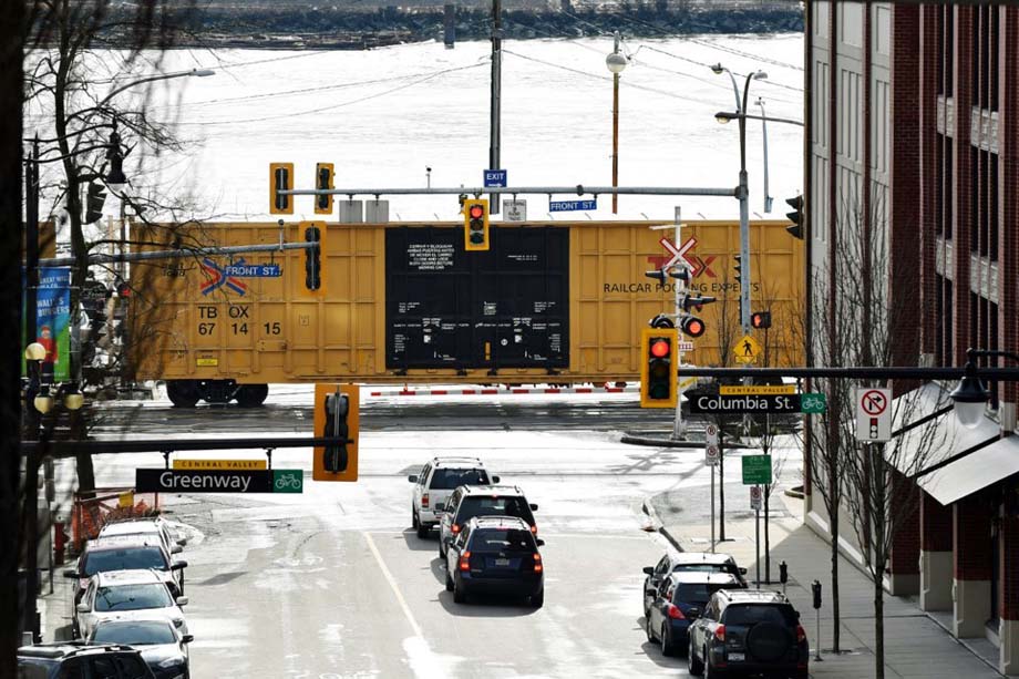 A freight train passes through downtown New Westminster.