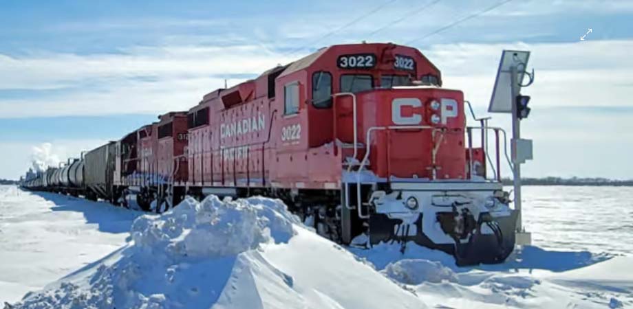 A CPKC freight train on the prairies.